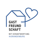 Logo für Gastfreundschaft. Ein stilisiertes Haus mit einem Luftballon in Herzform.